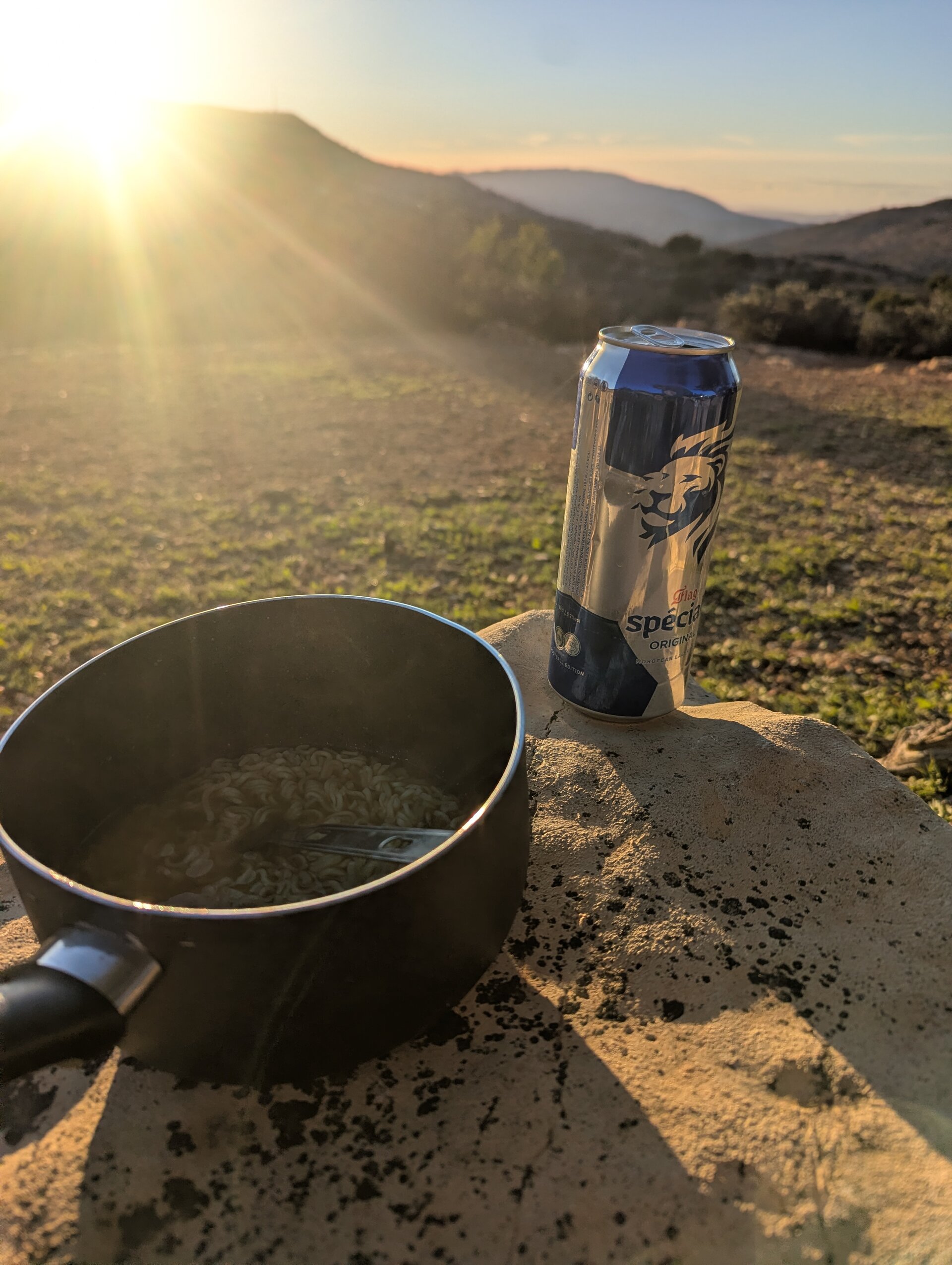 Beer, instant noodles, and sunset
